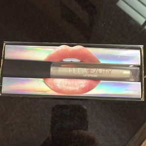 HUDA beauty shimmer strobbing metallic lip gloss